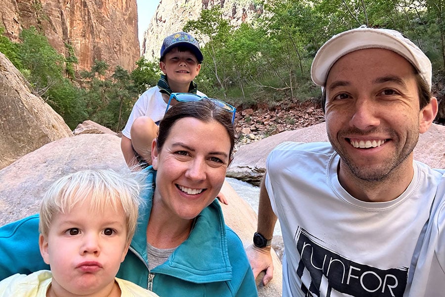 Alan with wife and sons hiking